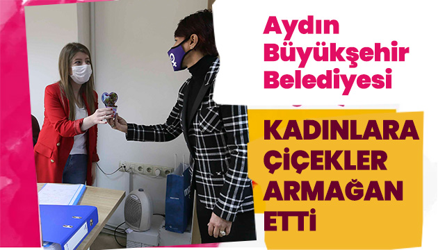 BÜYÜKŞEHİR BELEDİYESİ KADINLARA ÇİÇEKLER ARMAĞAN ETTİ